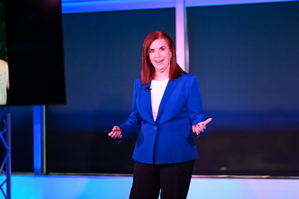 Professional speaker presenting in the Dallas event space
