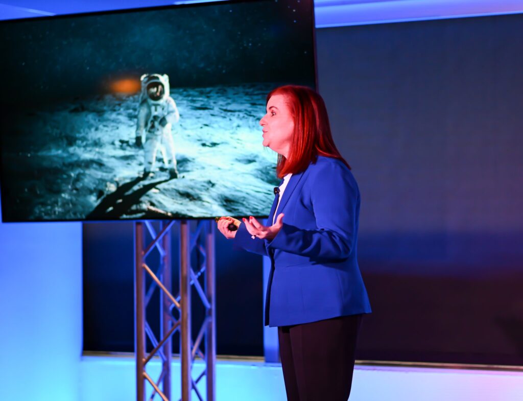 Speaker on stage in the Dallas event space